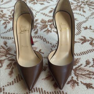 Christian Louboutin Brown Leather Pointed-Toe Pumps with Red Sole.  as pictured